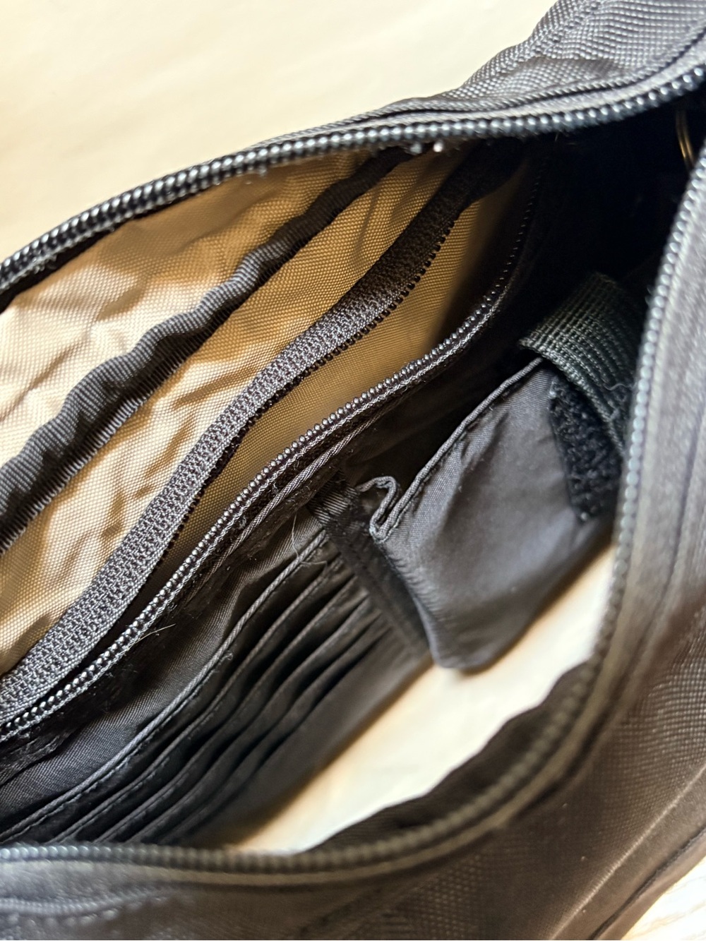 PacSafe | CitySafe Series 100 Travel Crossbody Small Black Handbag w/ eXomesh - Picture 9 of 12